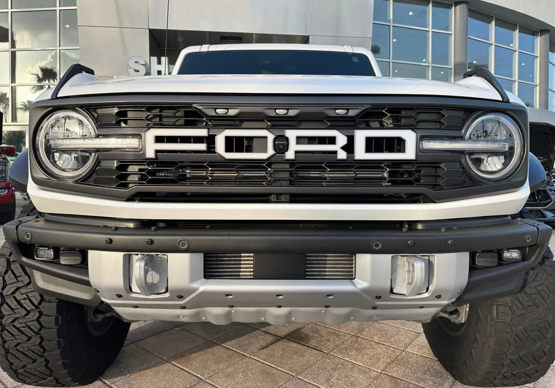 White Ford Bronco front view with Raptor grille letter overlays fitting 2022-2024