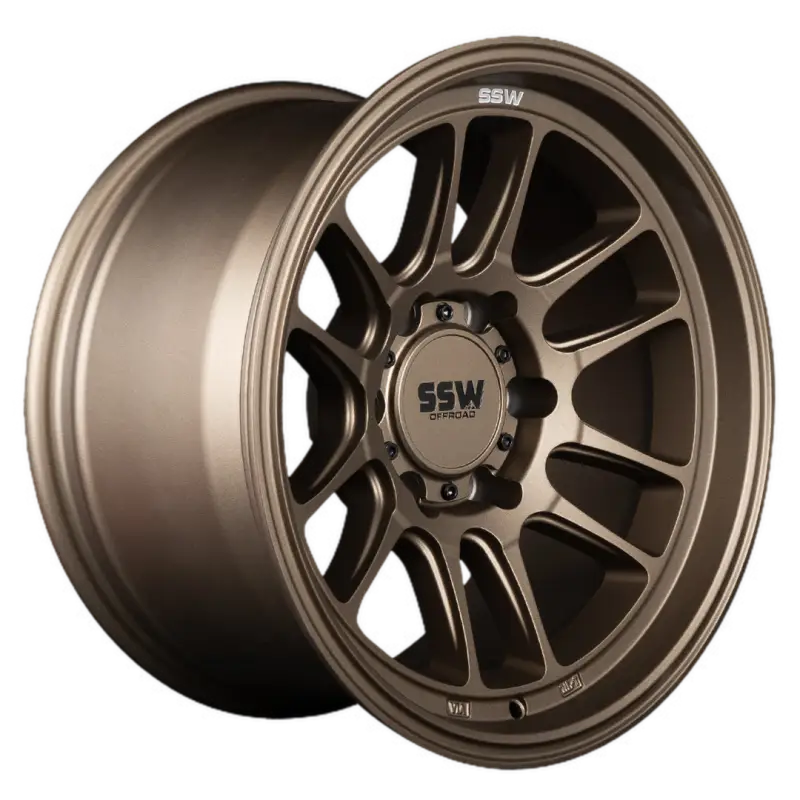 Side angle view of the RAPTOR matte bronze wheel by SSW, showcasing its 17x9 size, 6x139.7 PCD, and sleek off-road design.