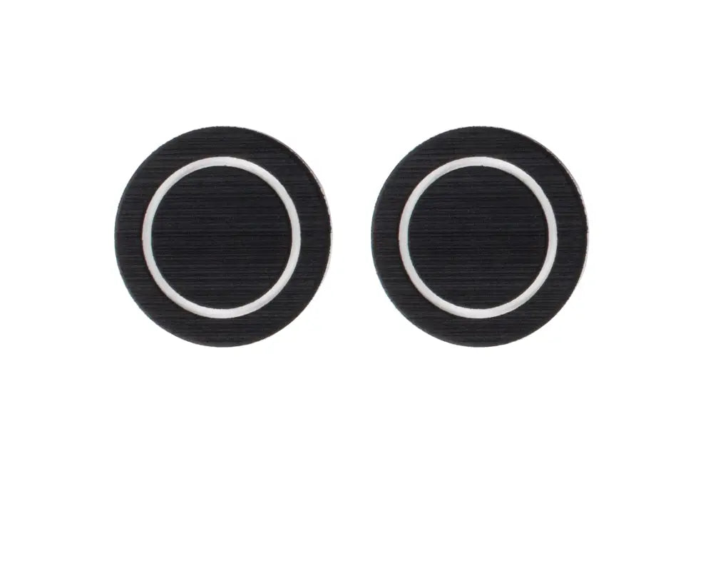 Pair of black foam rear seat cup holder inserts with white circular accents, compatible with 2007-2021 Toyota Tundra models.