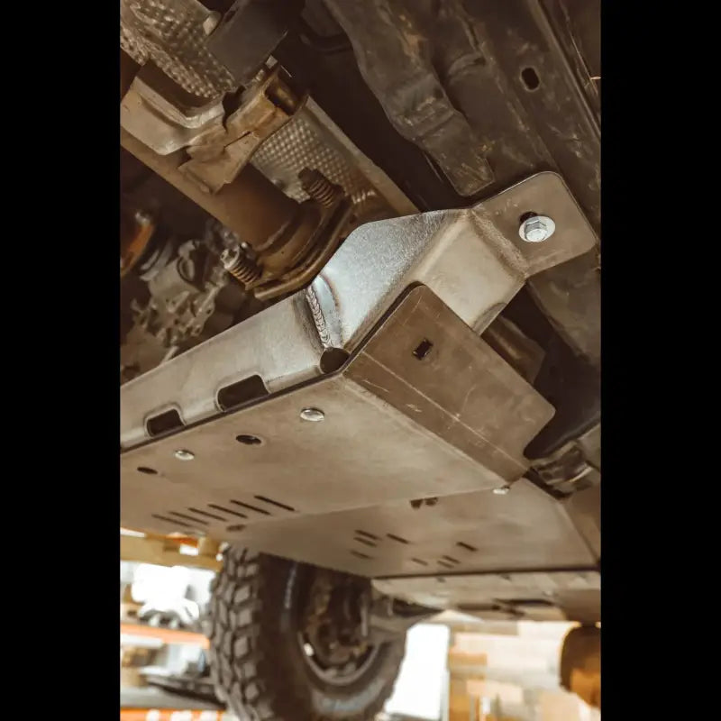 Side view of bolt-on 4Runner rear skid plates for 5th Gen 2010+, showcasing durable steel construction and precise fitment.