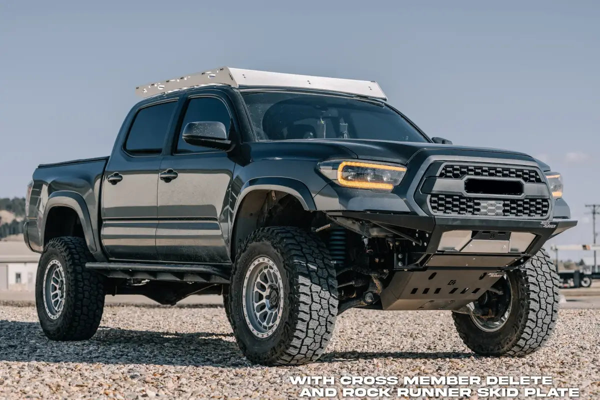 2016+ Tacoma with Rock Runner front skid plate and cross member delete, emphasizing off-road durability and compatibility with C4 bumpers.