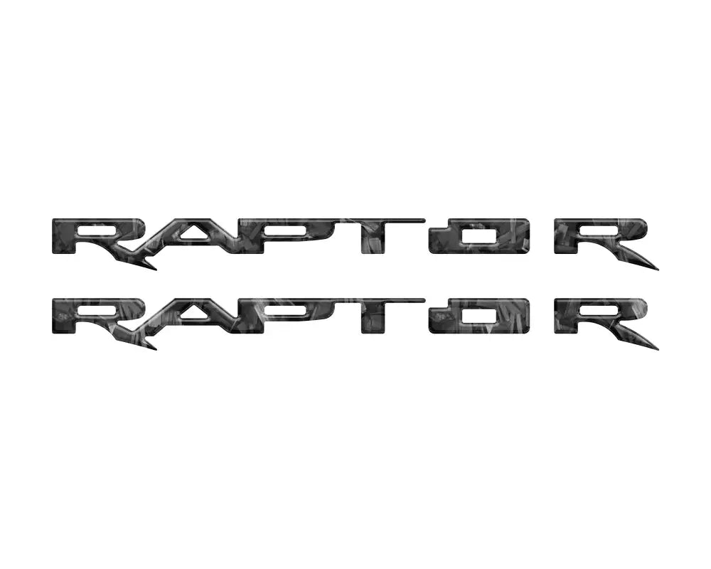 Two Ford Raptor running board emblem overlays featuring Raptor decals for vehicle customization