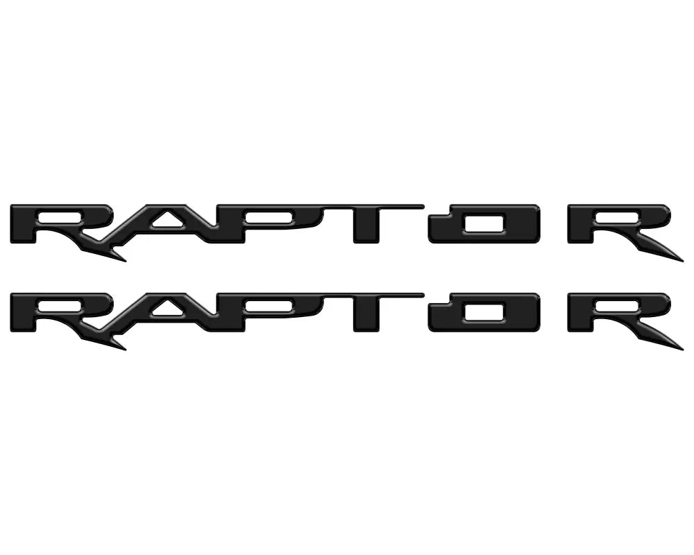 Two black RAPTOR emblem overlays for running board emblems on Ford Raptor trucks