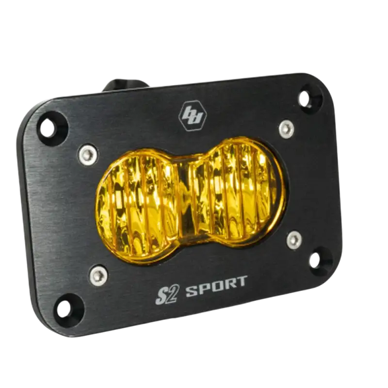 Black rectangular Baja Designs S2 Sport Flush Mount LED Light with yellow lenses for wide driving