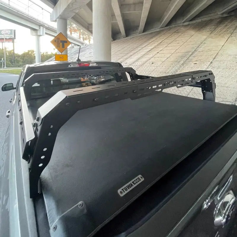 Close-up of Ford Maverick Shiprock Mid Height Rack installed with tonneau cover compatibility, ideal for camping and heavy-duty cargo.