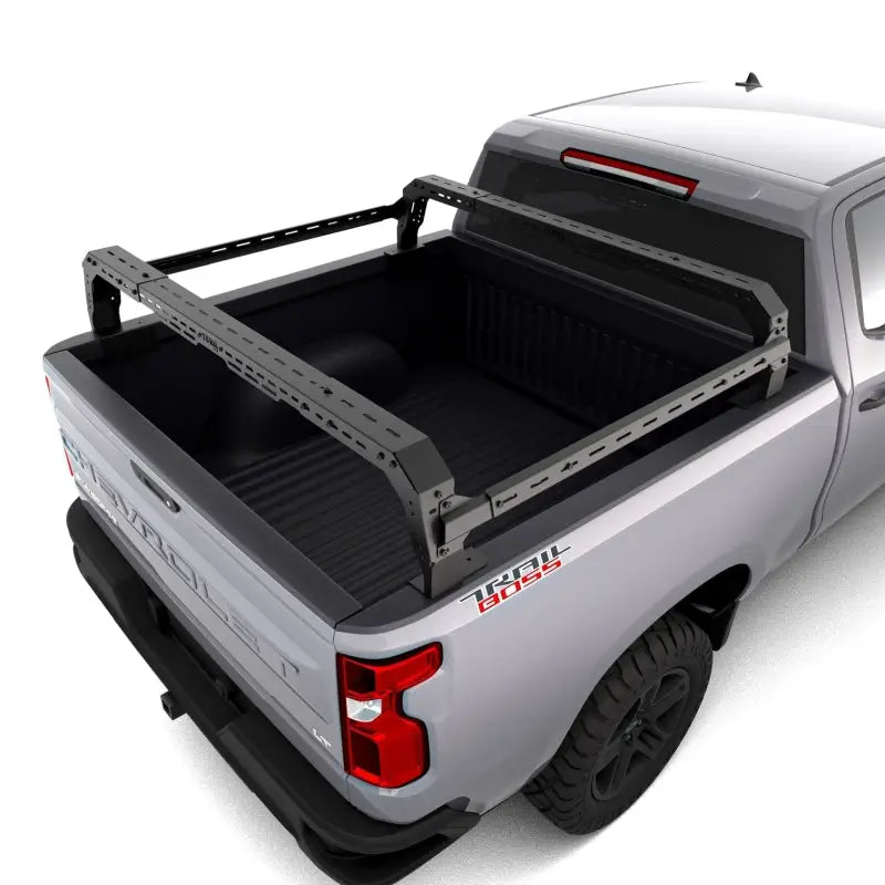 Top view of GMC Sierra 1500 bed featuring the Shiprock Mid Height Rack, showcasing its adjustable design and robust cargo support.