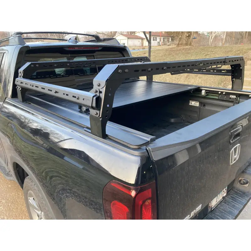 Side view of Honda Ridgeline showcasing a TUWA PRO®️ modular bed rack system, compatible with tonneau covers and overlanding gear.