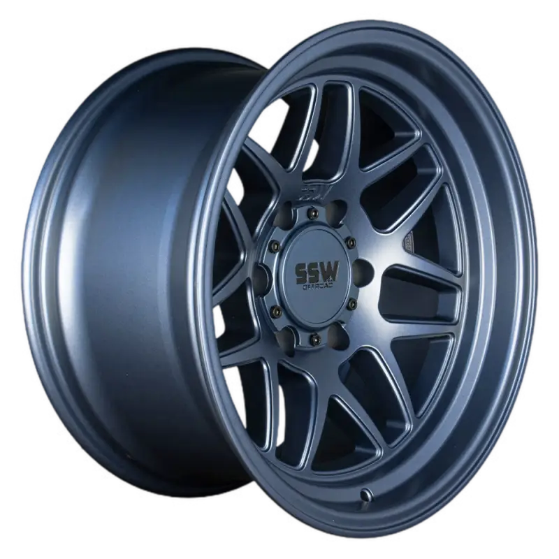 Side view of SIERRA matte blue wheel, 17x9.0 size, showcasing its deep lip and multi-spoke design for off-road vehicles.