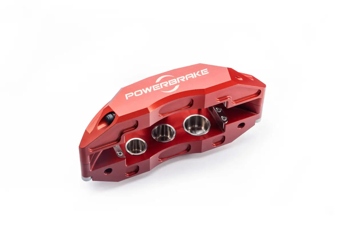 Single red 6-piston caliper from the Tundra Stage-1 big brake kit, emphasizing its lightweight design and stainless steel piston integration.