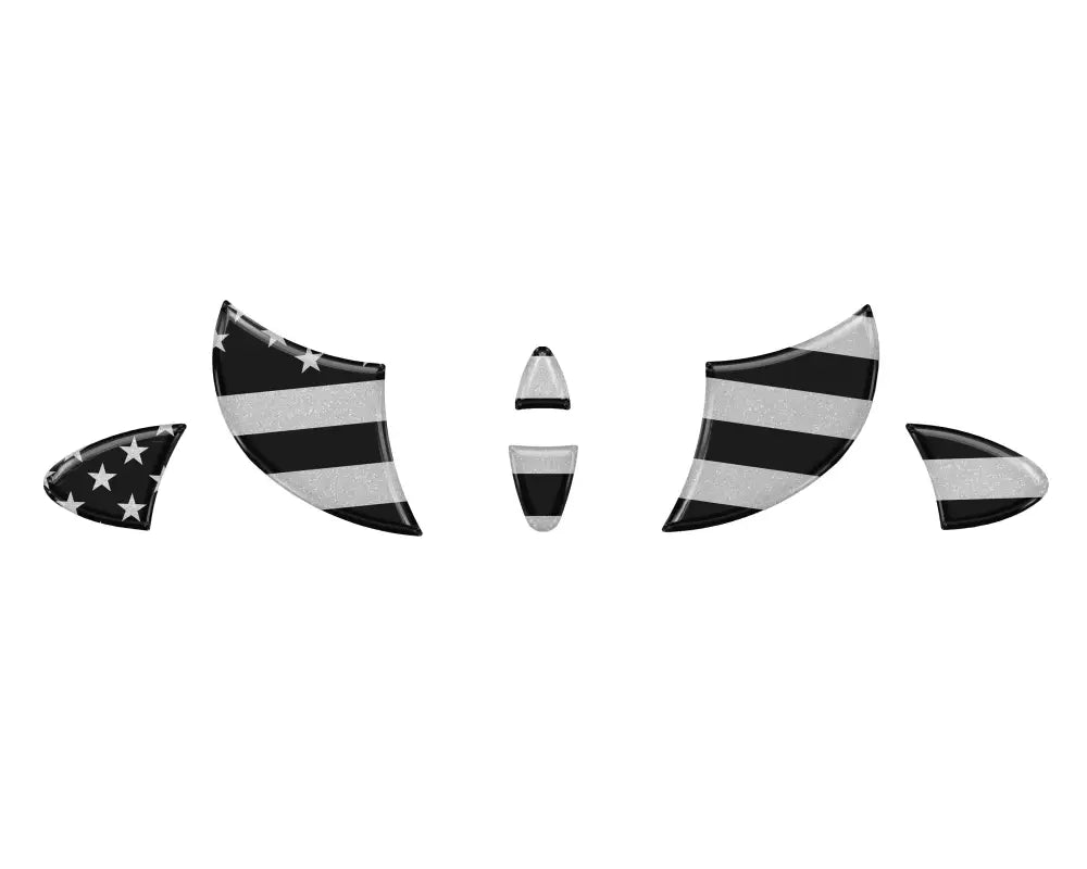 Black and silver American flag-themed steering wheel emblem inserts for 2015-2024 Toyota Tundra and 2023-2024 Toyota Sequoia. Stylish and patriotic.