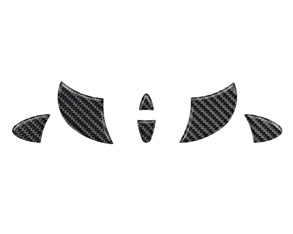 Carbon fiber-style steering wheel emblem inserts compatible with 2006-2014 Toyota FJ Cruiser, enhancing vehicle decor.