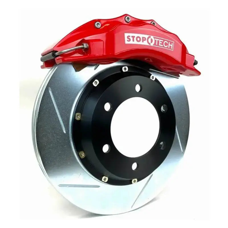 Toyota Tacoma 6-piston front big brake kit with red StopTech caliper and slotted rotor for enhanced off-road performance.