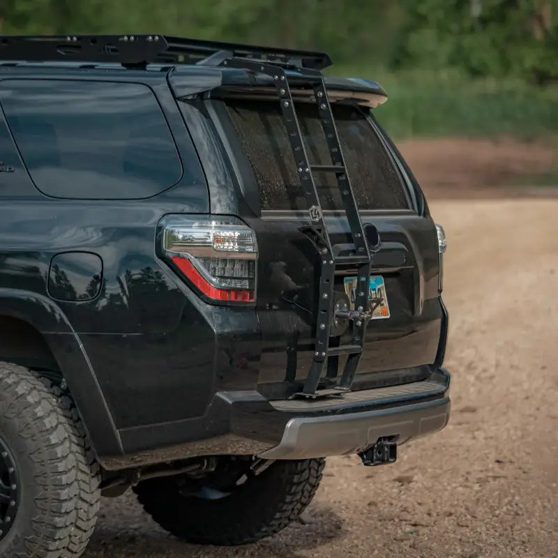 4Runner Hatch Ladder - Aluminum mounted on a 5th Gen 4Runner, compatible with roof racks like Sherpa and Prinsu. Powder-coated finish.