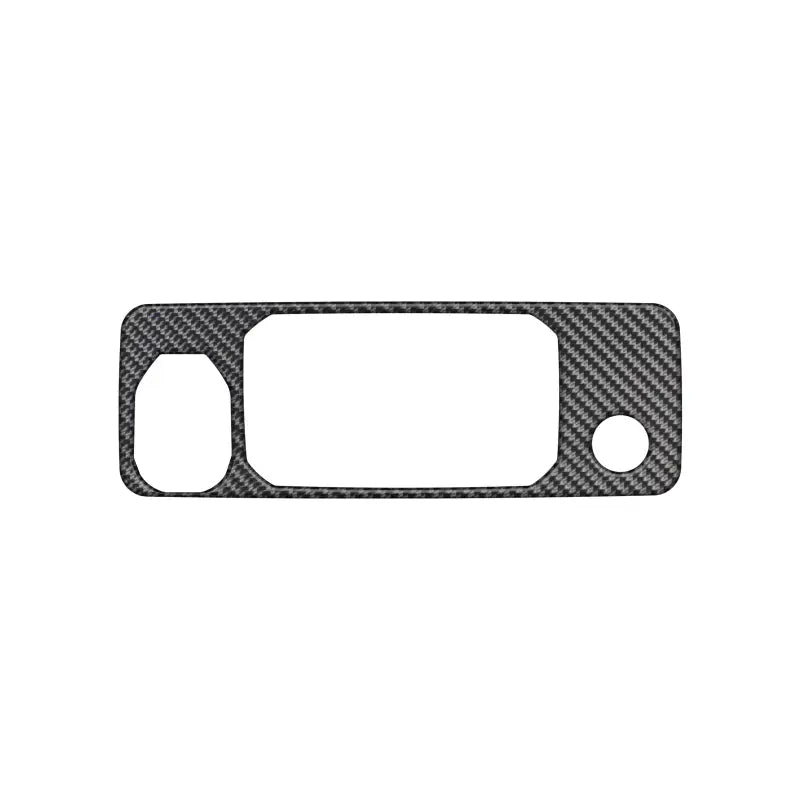 Carbon fiber tailgate handle accent overlay for 2016-2023 Toyota Tacoma, featuring a precise cutout design for easy installation.