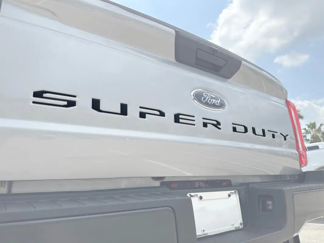 Ford Super Duty tailgate showing custom tailgate letter inserts for 2023-2024 models