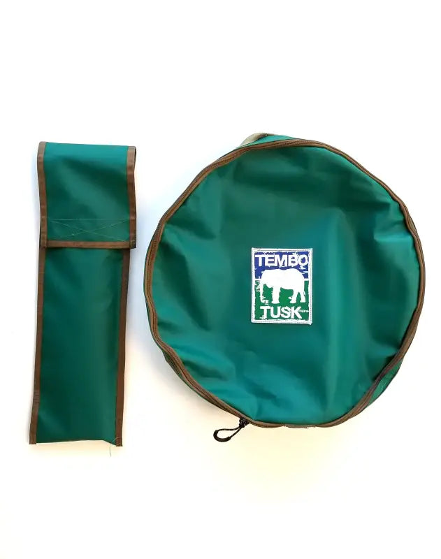 Back view of TemboTusk green carry bag with straps and storage compartments for Skottle Grill Kit components.