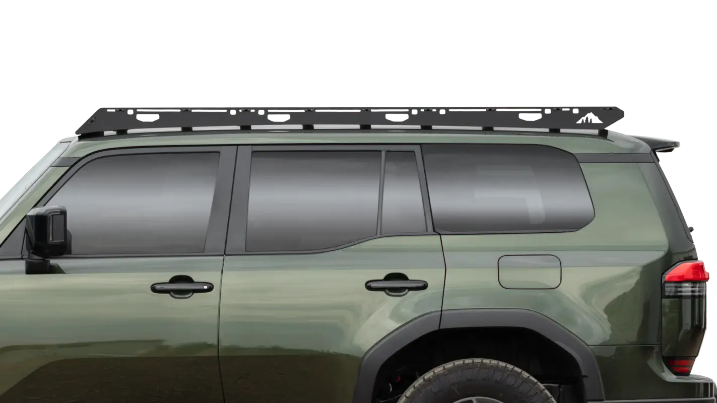 Close-up side view of The Atlas roof rack on a green 2024 Toyota Land Cruiser, highlighting its tough aluminum construction and black finish.