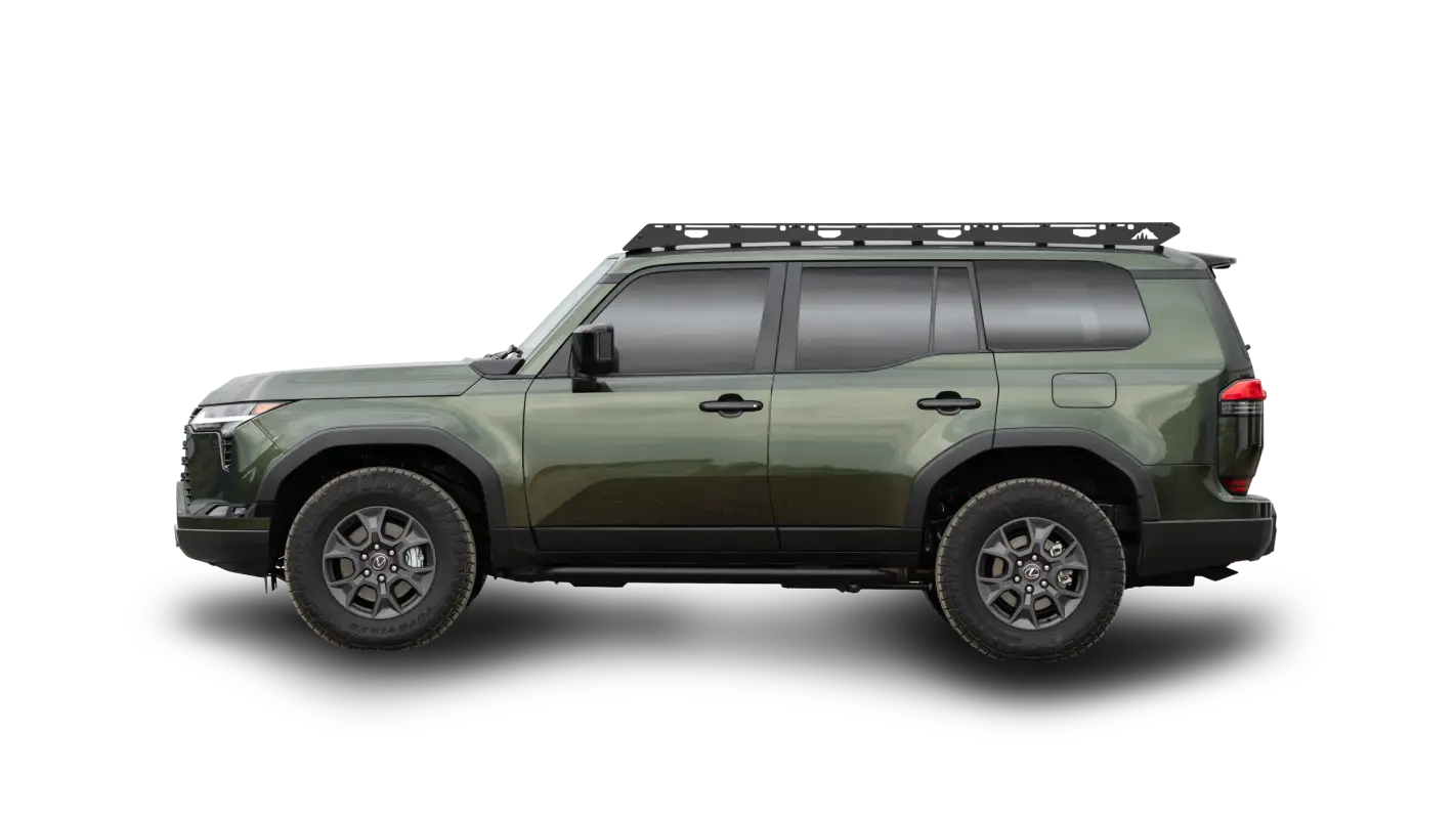 Side view of a green 2024 Toyota Land Cruiser with The Atlas roof rack, offering full-length cargo storage and rugged styling.