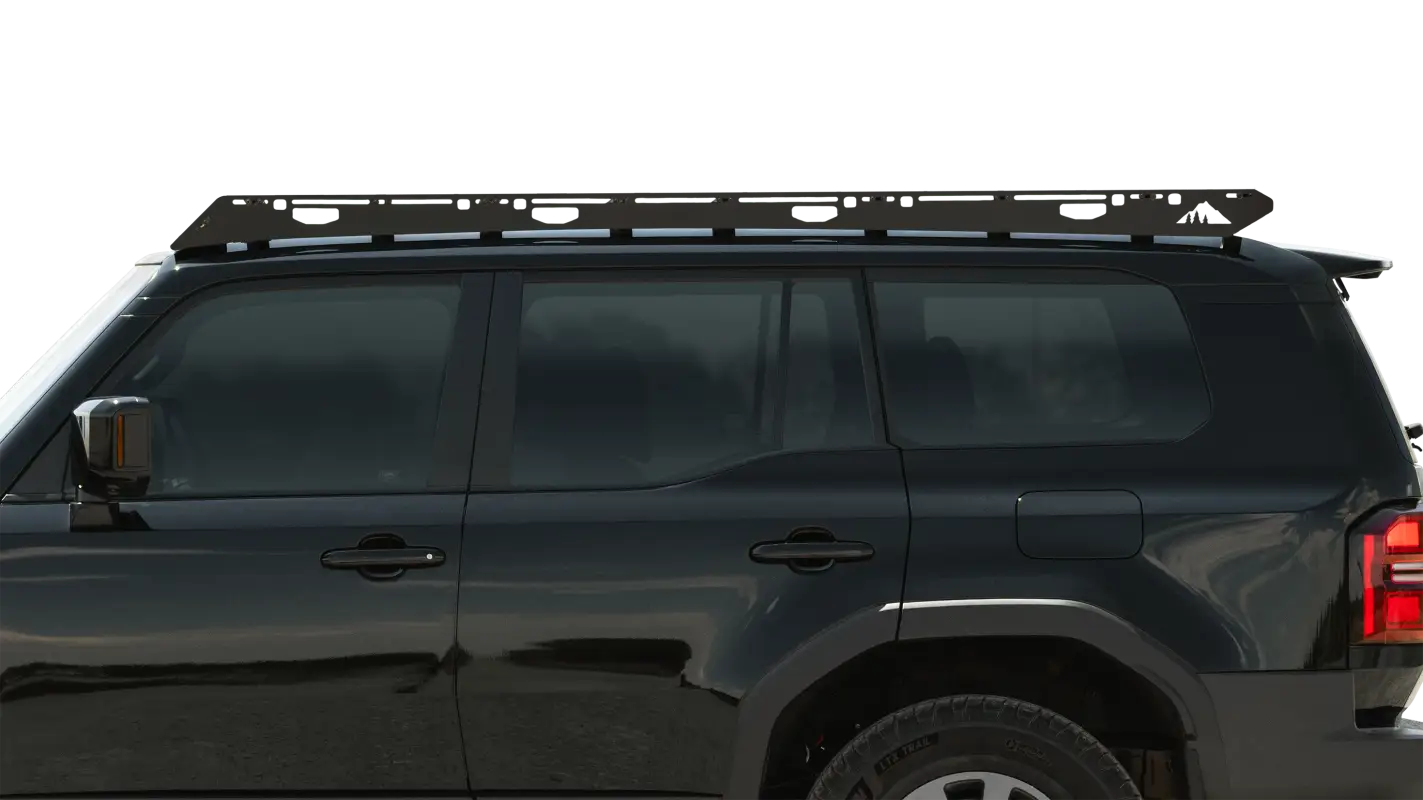 Close-up side view of The Atlas roof rack mounted on a black 2024 Toyota Land Cruiser, showcasing its sleek, no-drill design.
