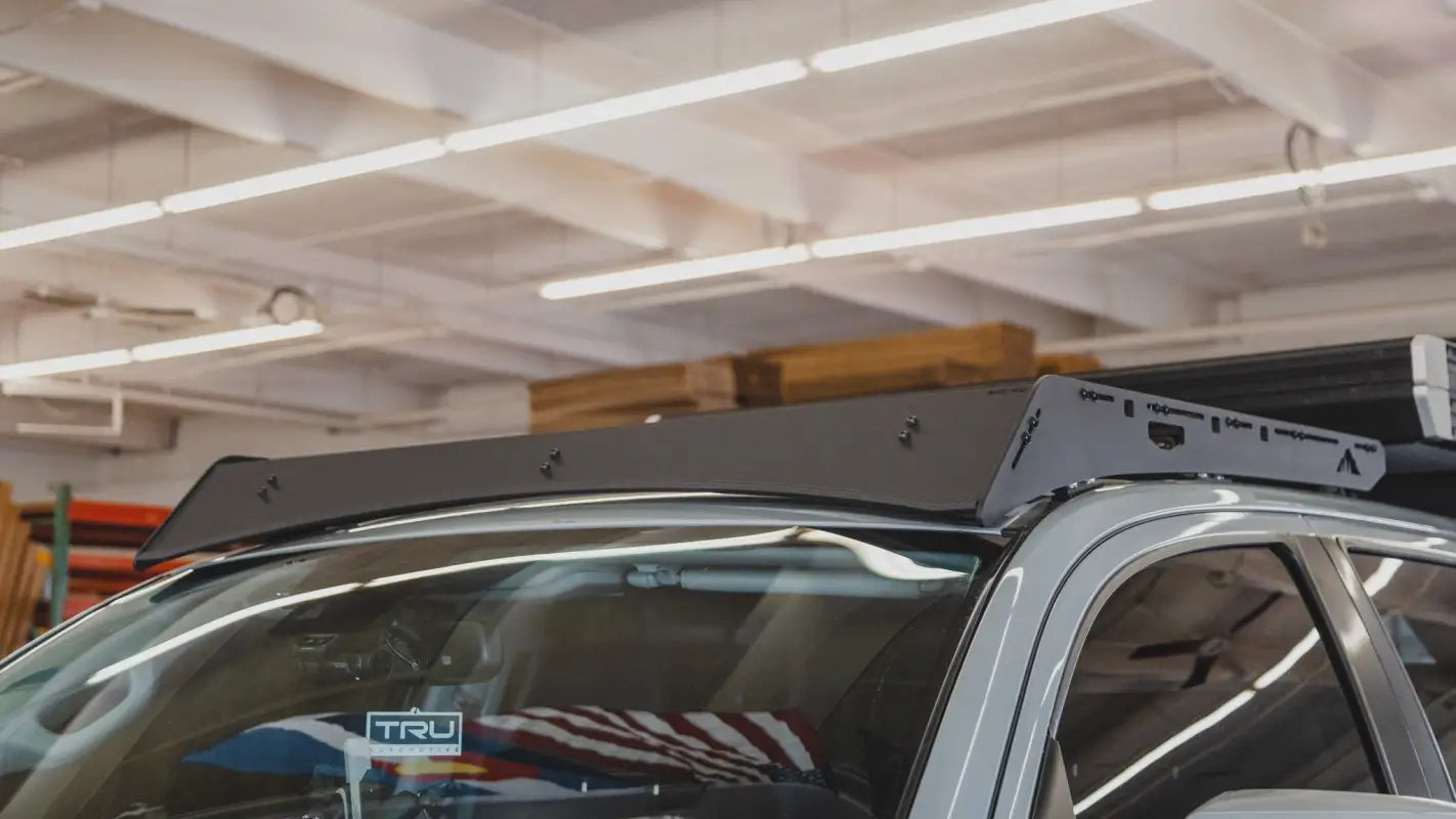 Front view of Bear Paw Roof Rack on Toyota Tundra, emphasizing its sleek fit and compatibility with solar panels and accessories.