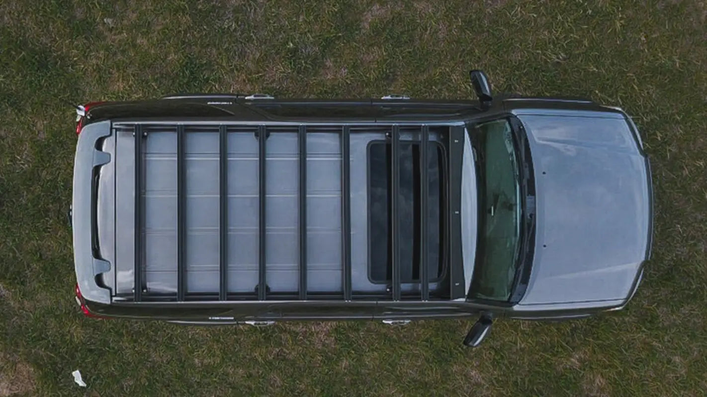 Top-down view of the Belford roof rack on a 2001-2007 Toyota Sequoia, highlighting its spacious cargo capacity and sturdy aluminum construction.