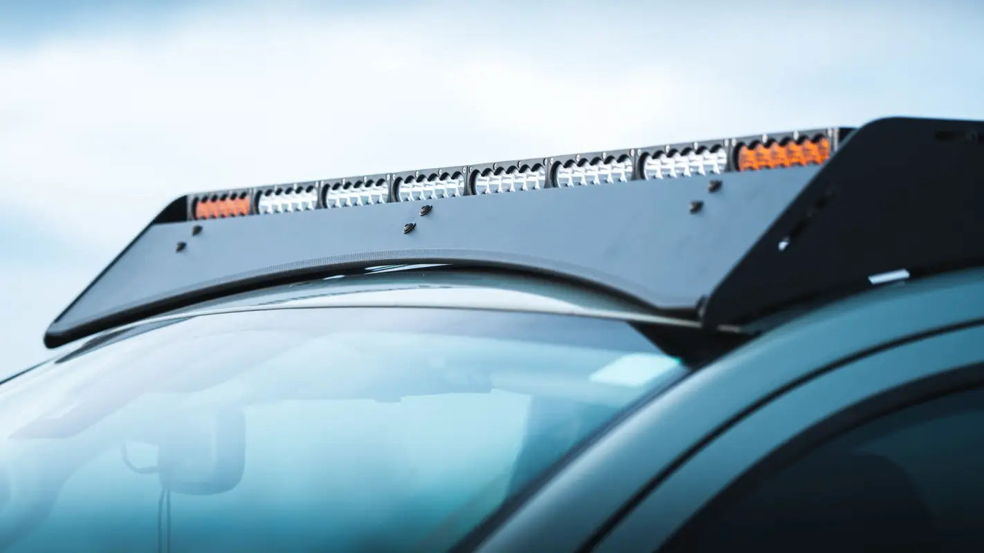 Big Bear Roof Rack on Toyota Tundra with integrated light bar, showcasing durable aluminum construction and sleek design.