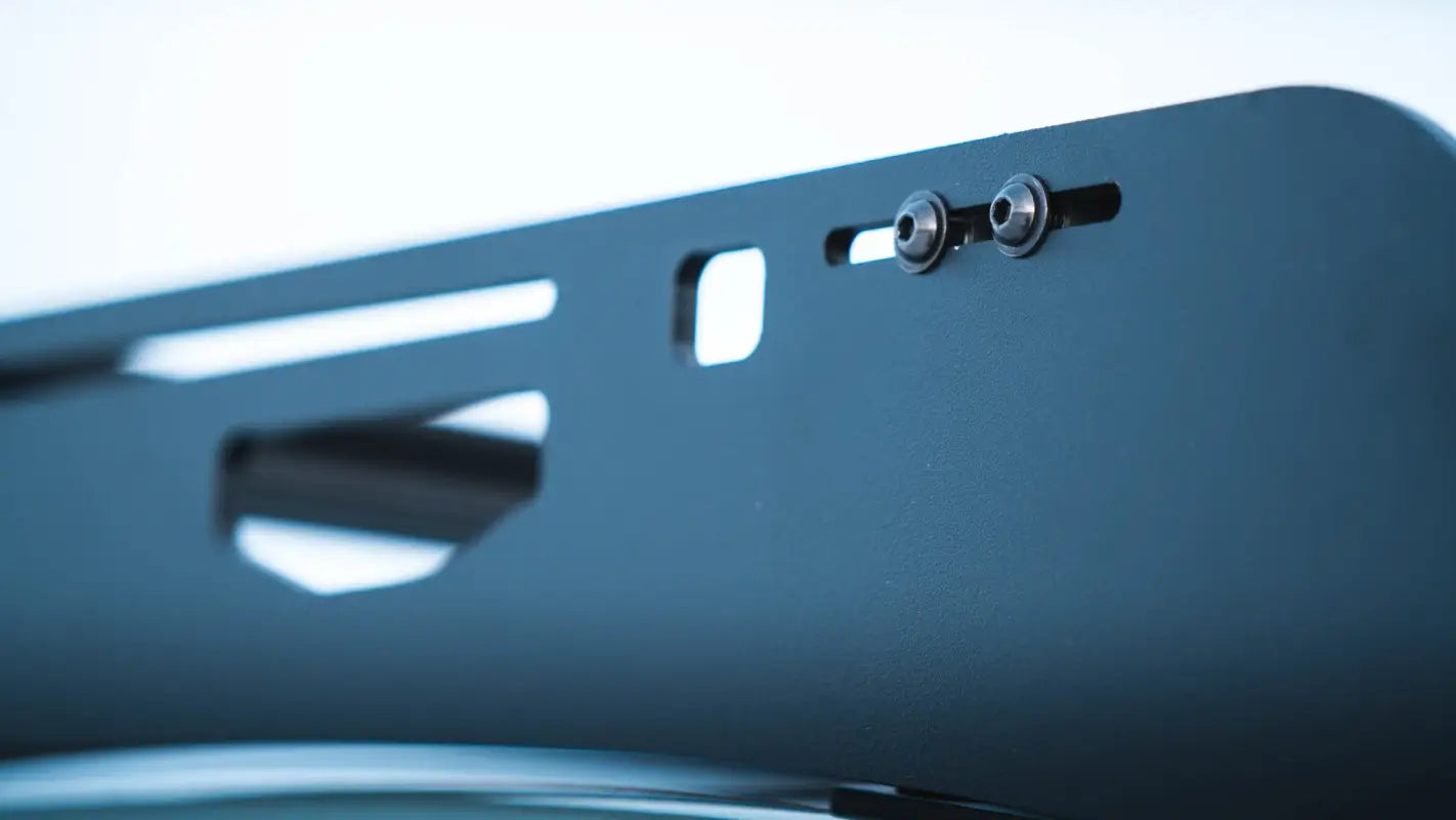 Close-up of Big Bear Roof Rack's mounting hardware, highlighting precision engineering and durable aluminum construction.