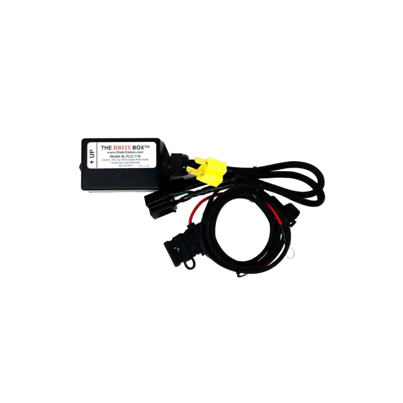 Brite Box wiring accessory with labeled module and attached cables, designed for specific vehicle models. Ideal for lighting upgrades.