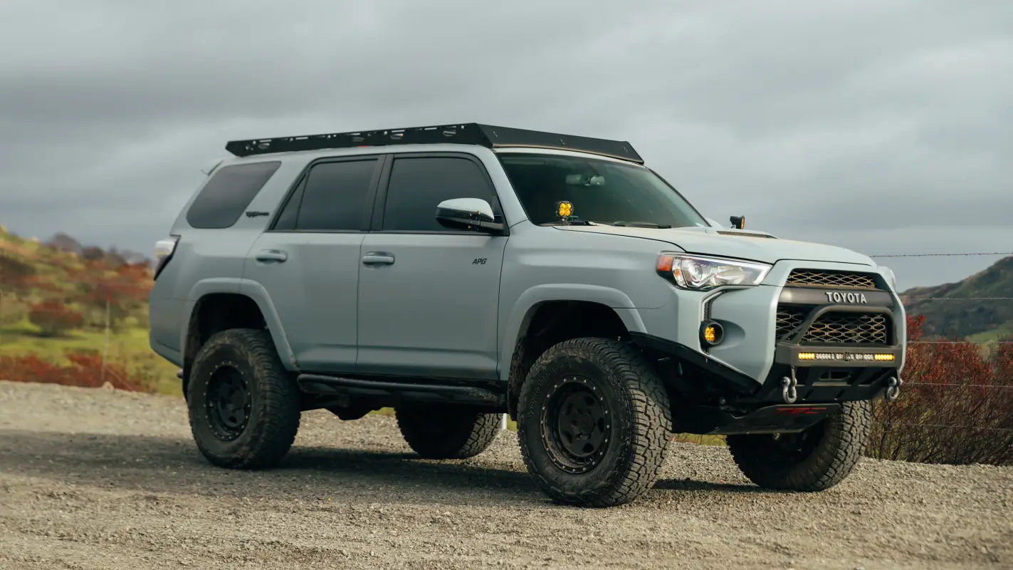 Gray Toyota 4Runner with full-length aluminum roof rack for off-road adventures