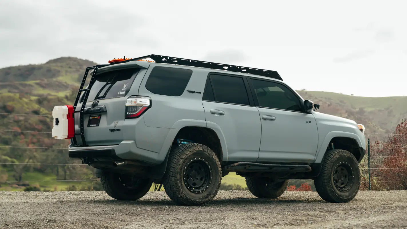 Gray off-road SUV with The Crestone aluminum roof rack for 10-24 4Runner