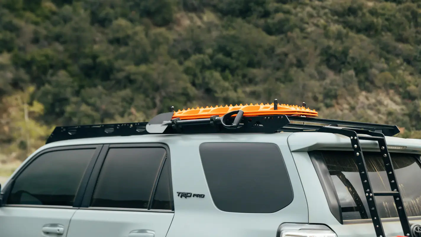 Off-road vehicle with full-length aluminum roof rack and ladder for 10-24 4Runner