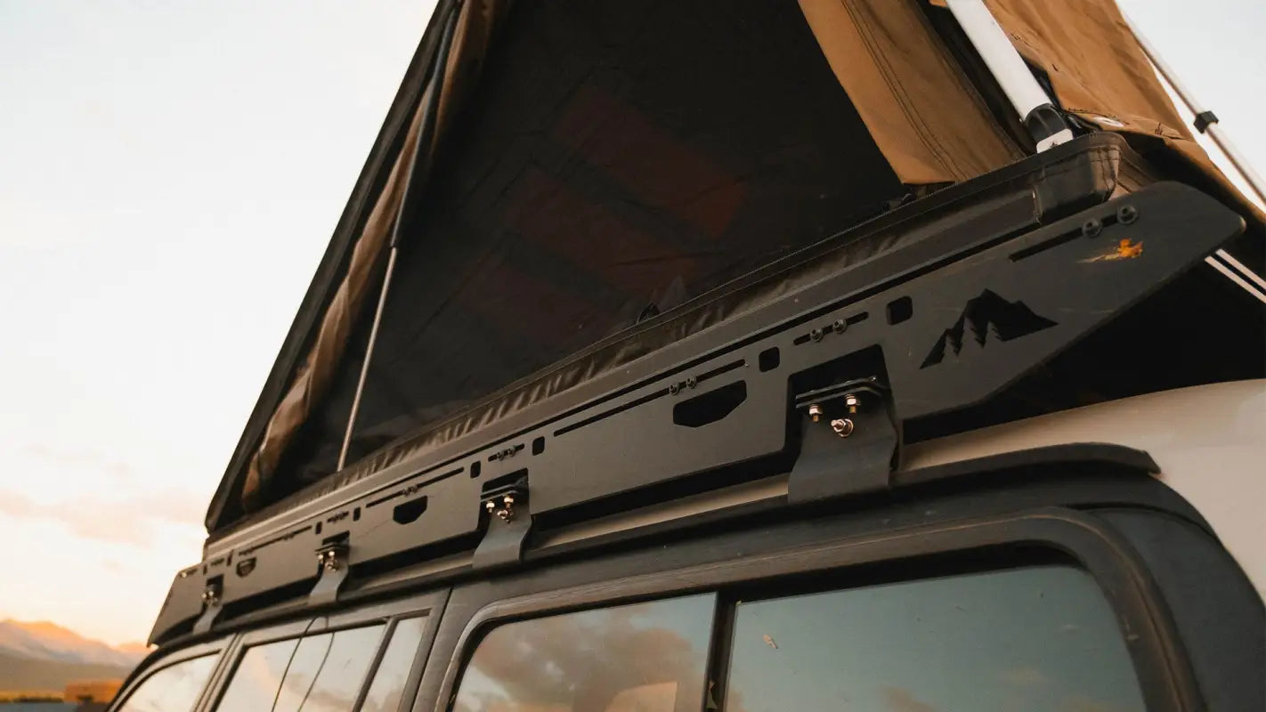 La Sal roof rack on an 80 Series Land Cruiser with a rooftop tent setup, ideal for overlanding and outdoor adventures.