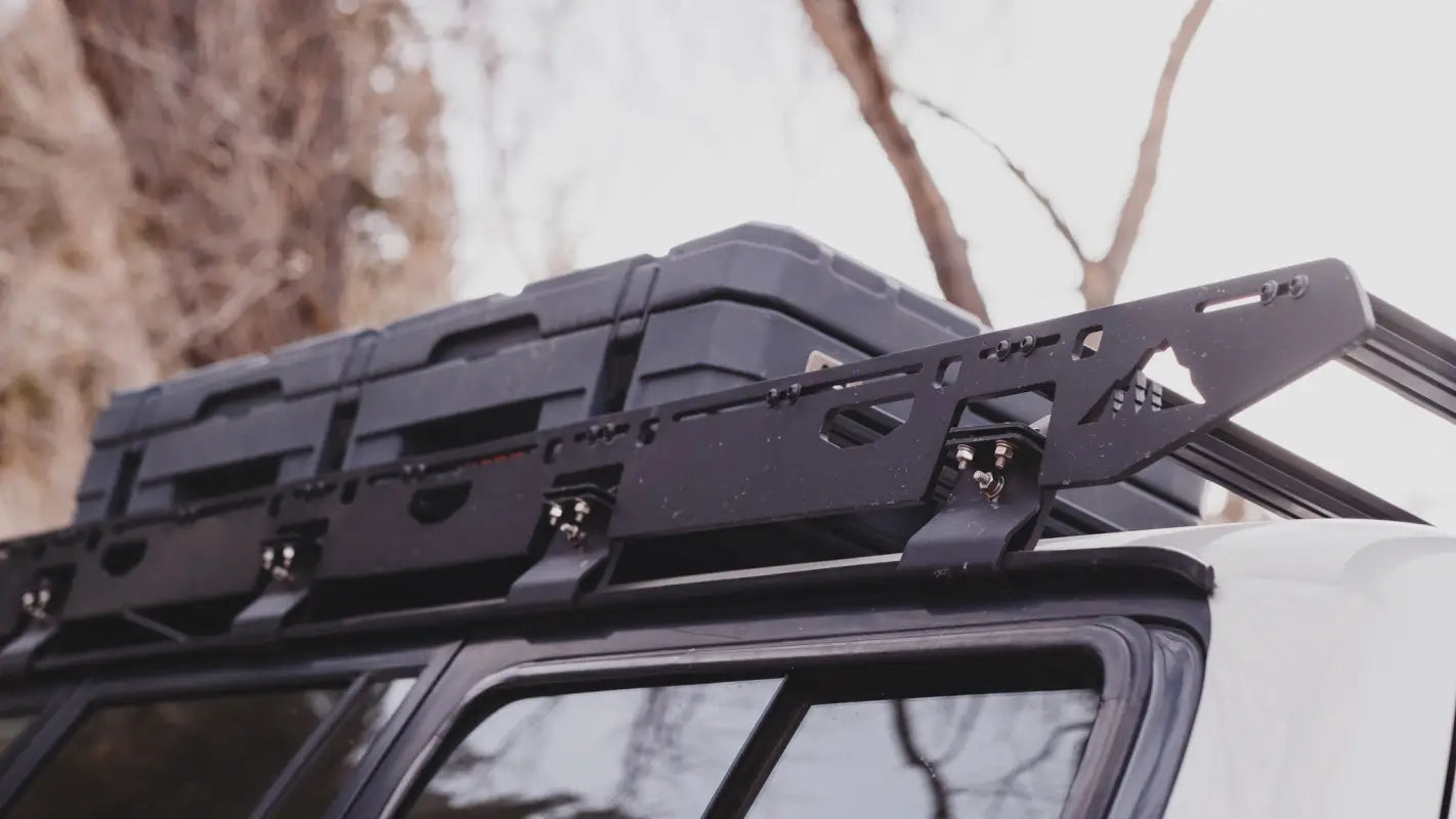 Close-up of the La Sal roof rack with storage boxes, showcasing its versatile cargo-carrying capabilities.