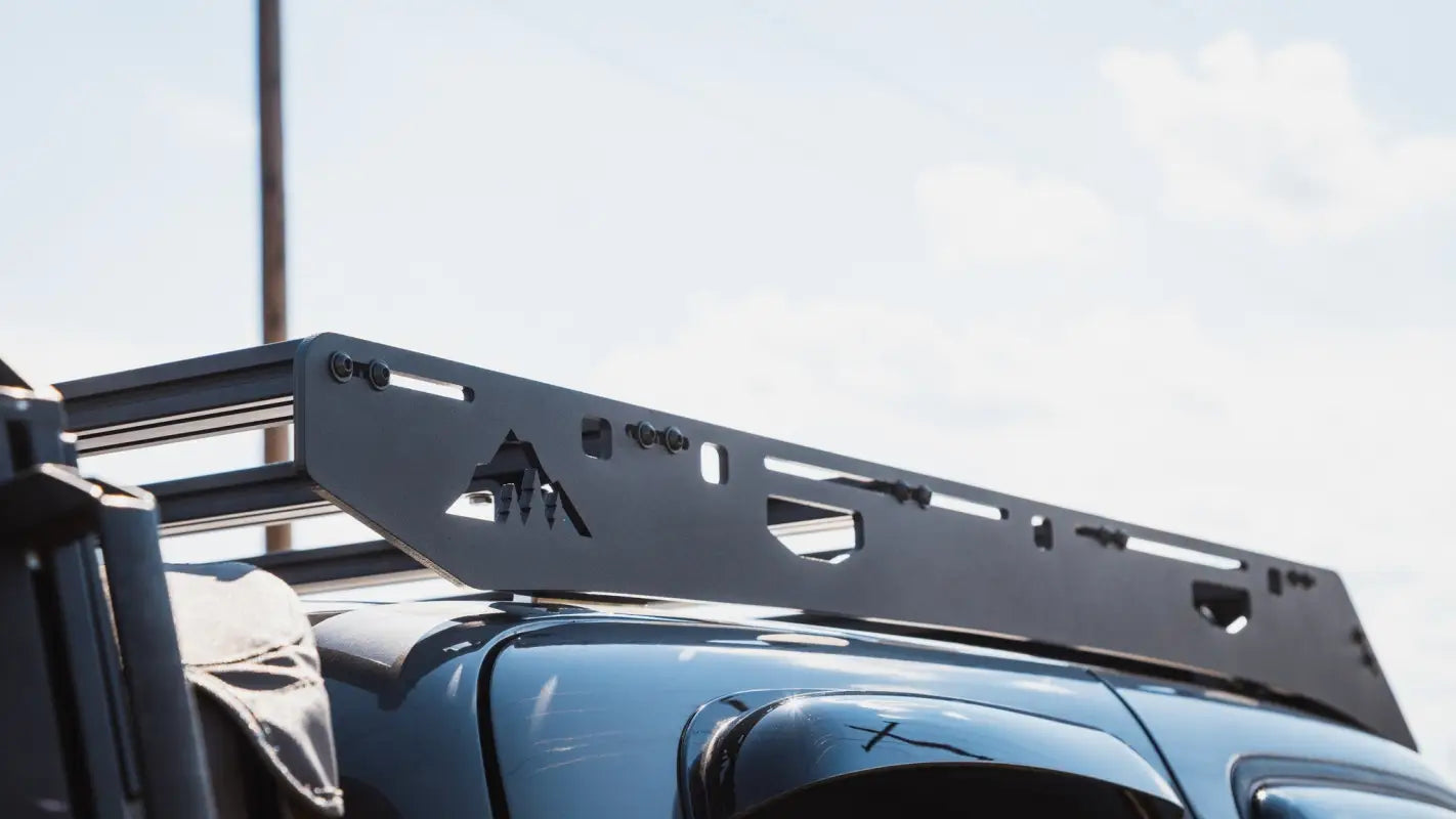 Side angle of Ursa Minor roof rack on Toyota Tundra, emphasizing precision-fit aluminum construction and rugged durability.
