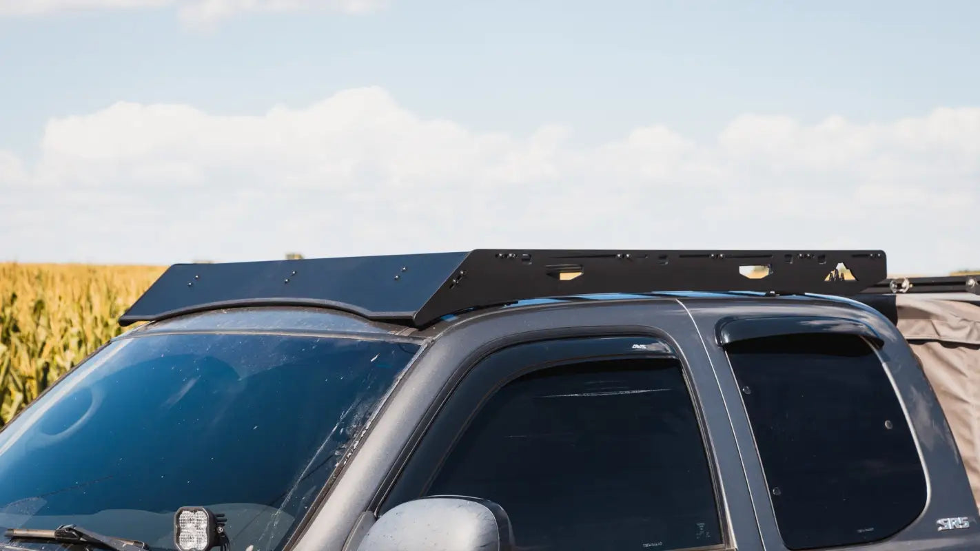 Front-side angle of Ursa Minor roof rack on Toyota Tundra, highlighting sleek design and tough build for adventure gear.