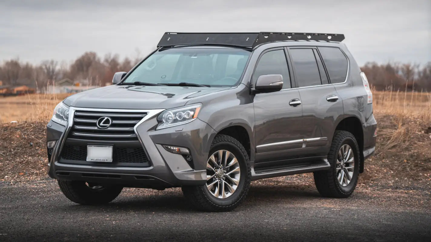Gray Lexus GX460 SUV with roof rack featuring stainless steel hardware