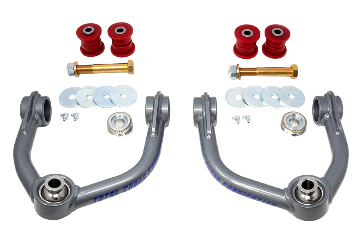 00-06 Tundra upper control arms with heavy-duty uniballs, CNC machined adapters, urethane bushings, and hardware for enhanced suspension performance.