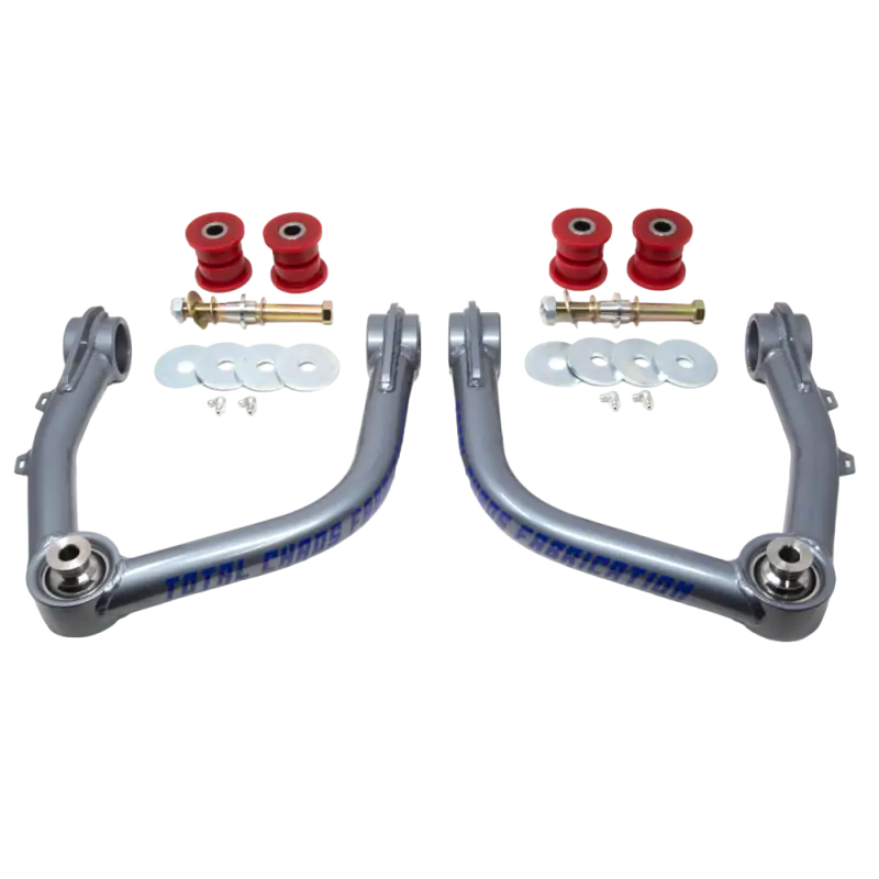 Total Chaos Upper Control Arms for Tundra 22+ with 4130 chromoly construction, bolt-on design, and corrosion-resistant finish. Includes bushings, washers, and hardware for installation.