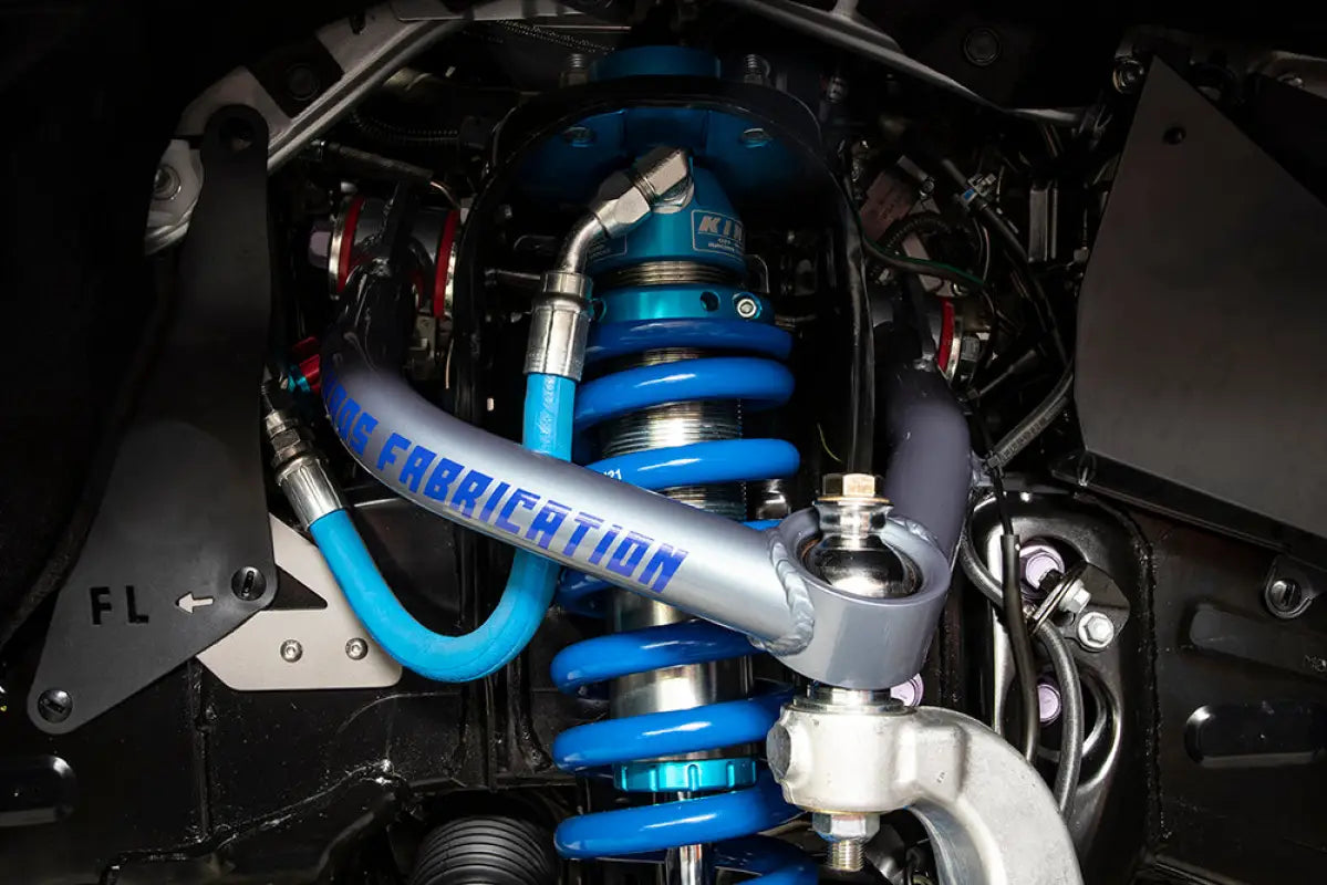 Installed Total Chaos Upper Control Arms on Tundra 22+ with blue coilover suspension, showcasing improved steering and compatibility with lift kits.