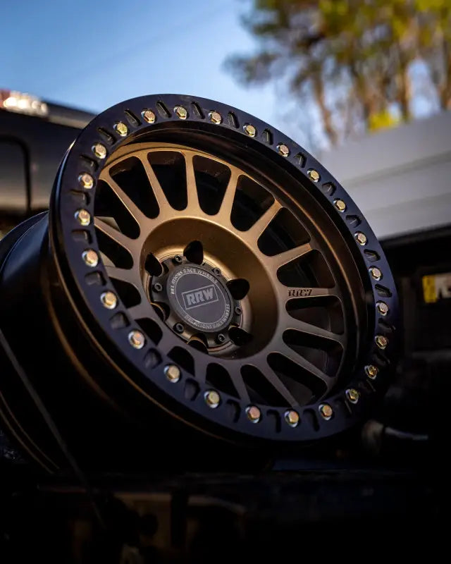 Close-up of True Beadlock Ring for Hybrid Wheels V2 installed on a wheel, showcasing knurled surface and robust off-road design.