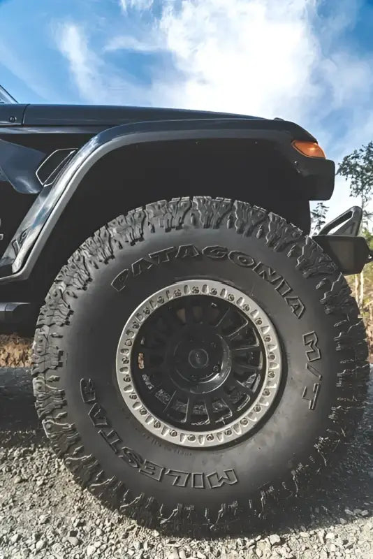 True Beadlock Ring for Hybrid Wheels V2 installed on a tire with Patagonia MT branding, showcasing rugged off-road performance.