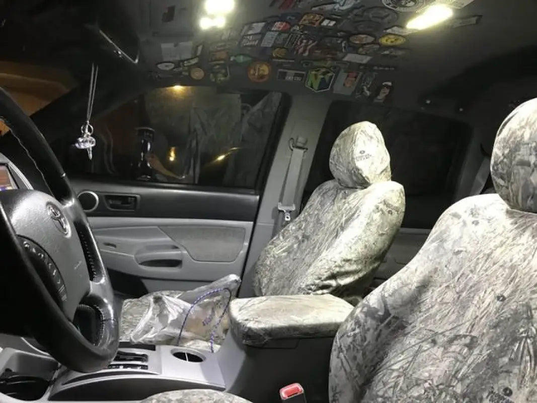 Installed Ultimate Map Lights in a 05-15 Tacoma interior, providing bright illumination with a clean and modern look.