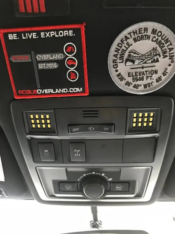 Ultimate Map Lights in a 16-23 Tacoma interior, highlighting bright LED panels and dashboard integration.