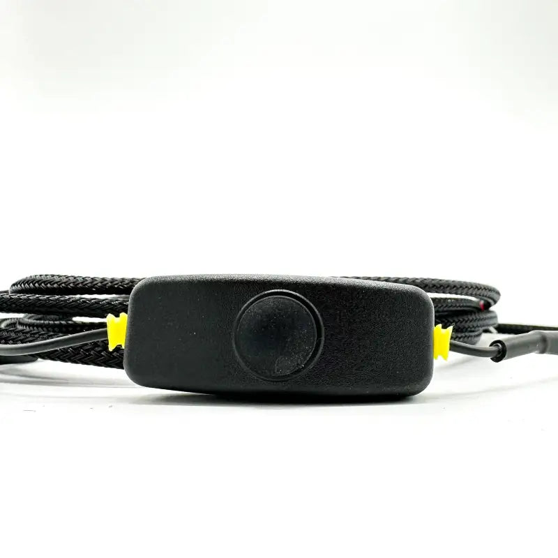 Close-up of the kill switch included in the under hood LED light kit, designed for easy control and reliable operation.