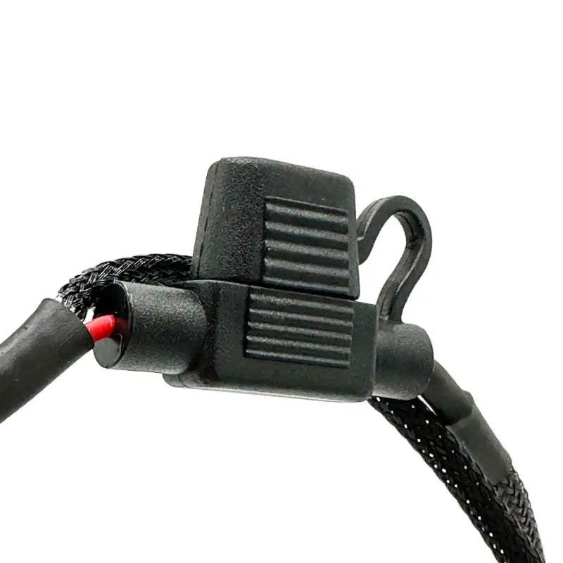 Close-up of the fuse holder from the under hood LED light kit, featuring a durable design for enhanced safety and reliability.