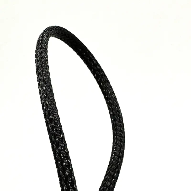 Close-up of the braided harness from the under hood LED light kit, showcasing its durable and high-quality construction.