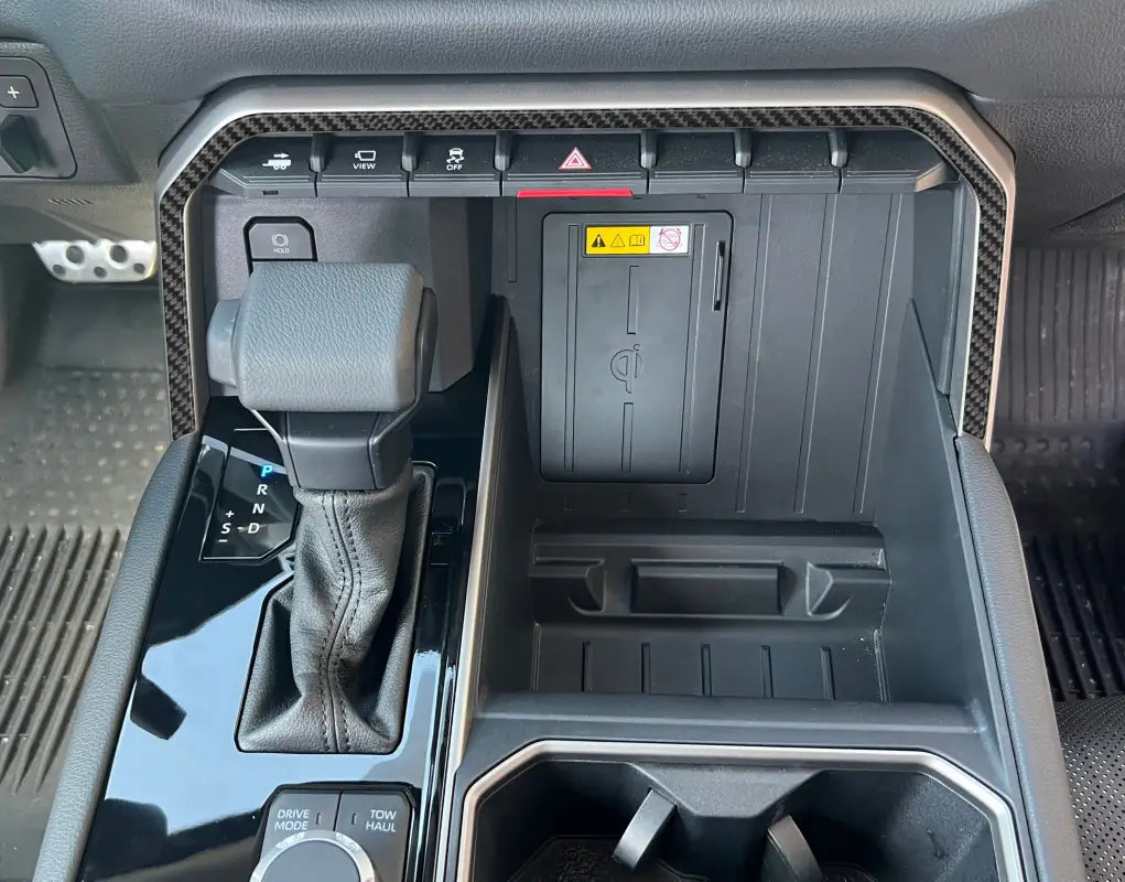 Close-up view of the upper center console line accent trim fitted on a Toyota Tundra or Sequoia, highlighting its precise fit and stylish finish.