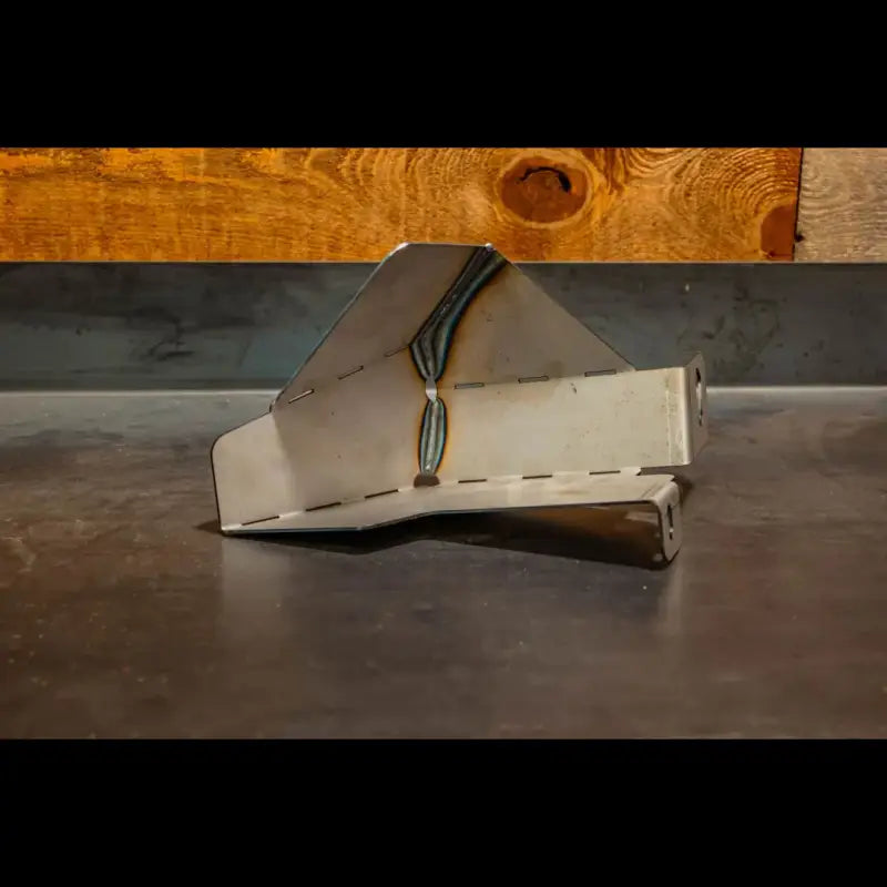 Steel 4Runner washer tank skid plate showcasing its robust construction and precise design for 5th Gen models, 2010 and newer.