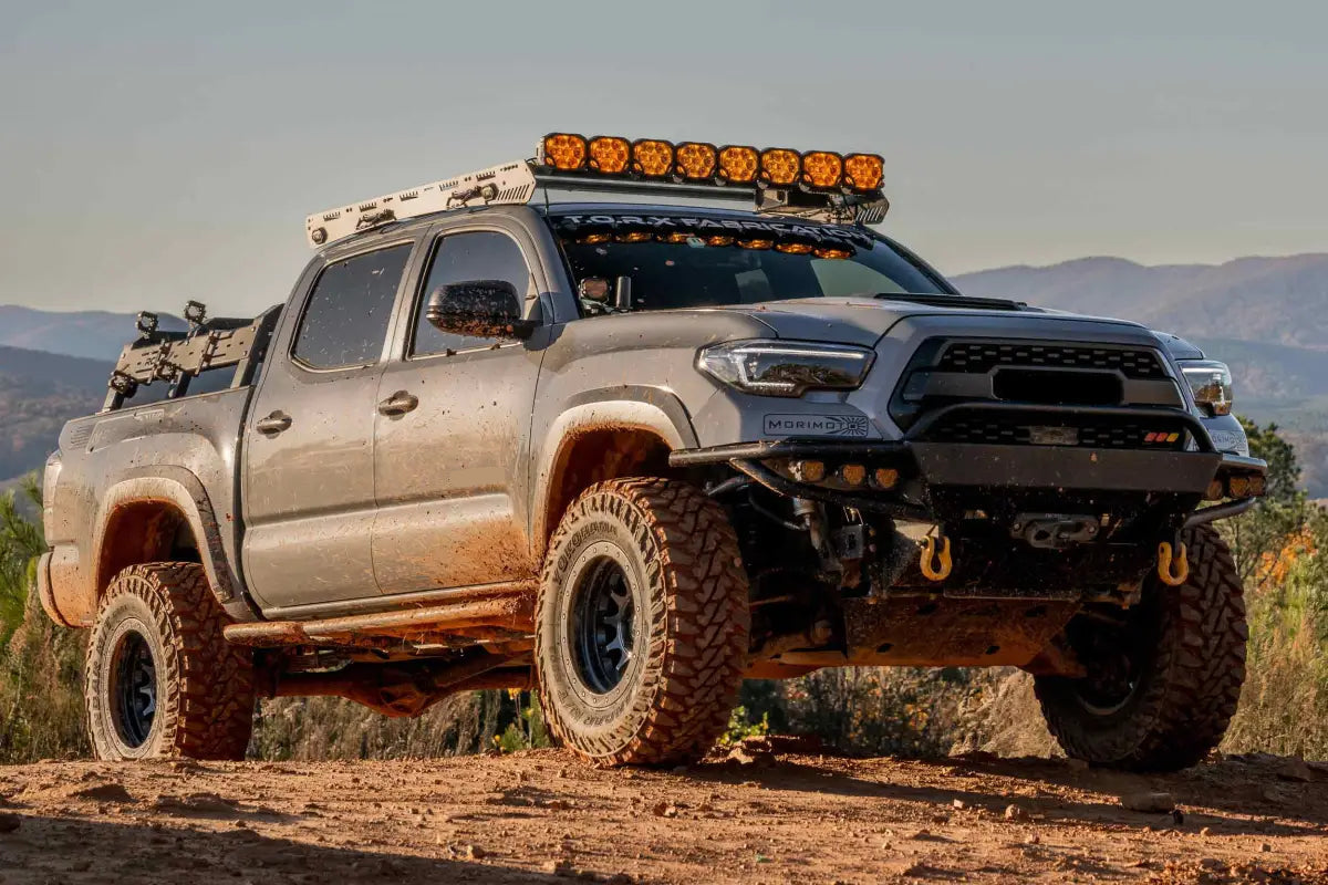 Gray Toyota Tacoma off-road truck with XB Evo Hybrid Headlights for 16-23 Tacoma