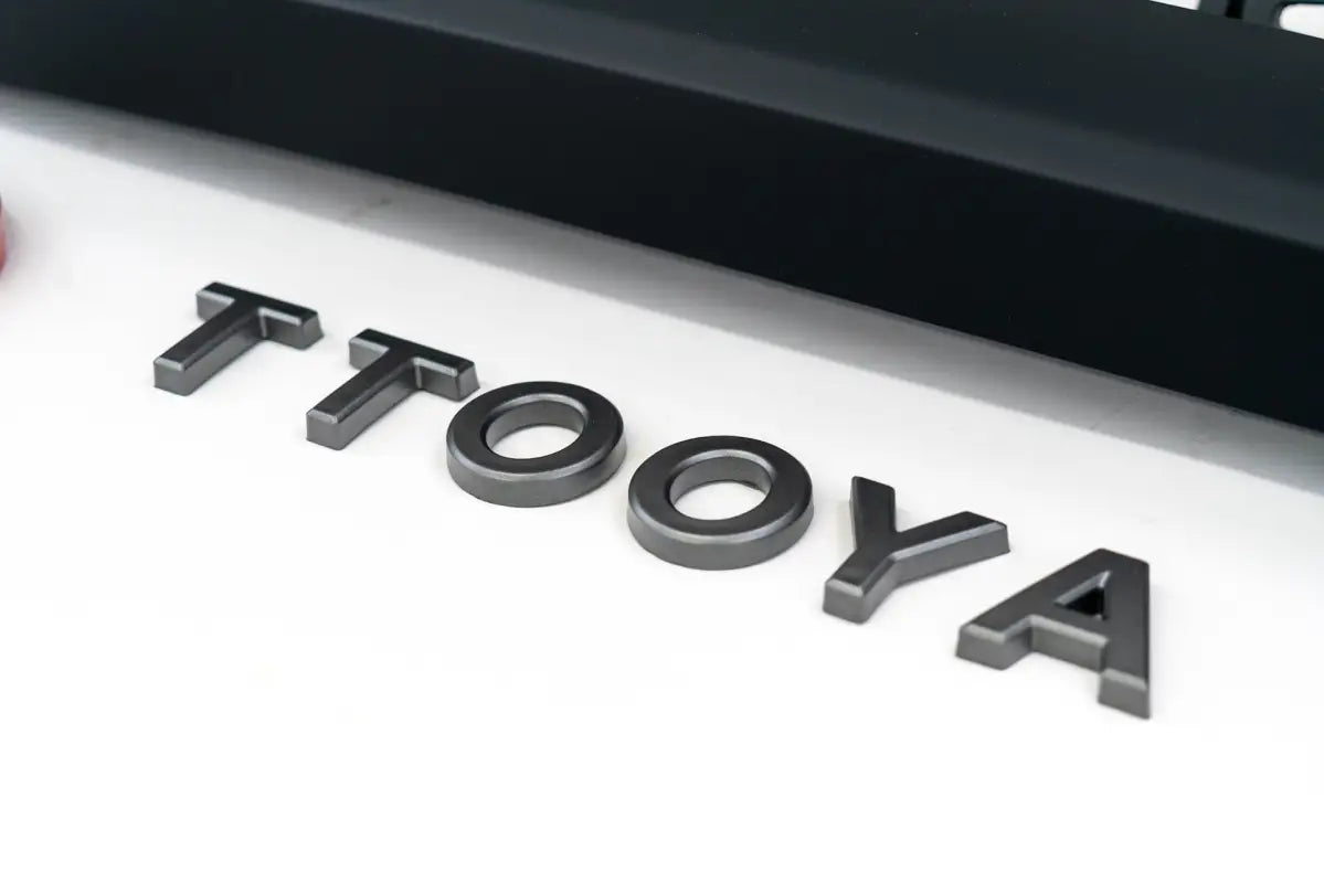 Metal TOOOYA letters on 2014-19 4Runner Pro Grille for a custom 4runner pro look